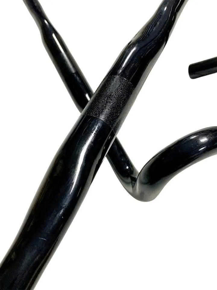 Used full carbon road bike handlebars (take-off). Slight glue residue, easily removable