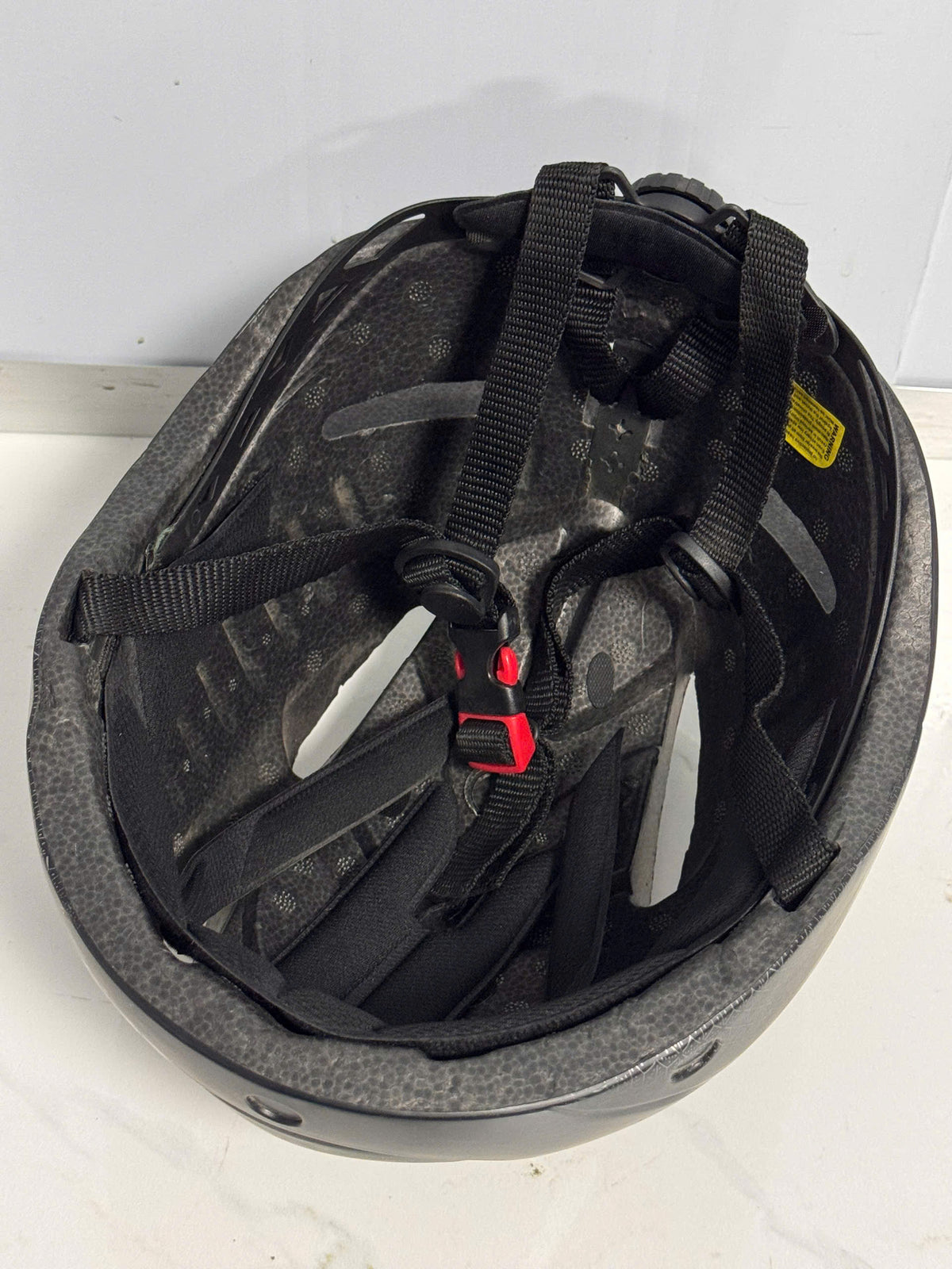 Patterned black bicycle helmet (minor cosmetic dent, fully functional) - Size L (57-62 cm)