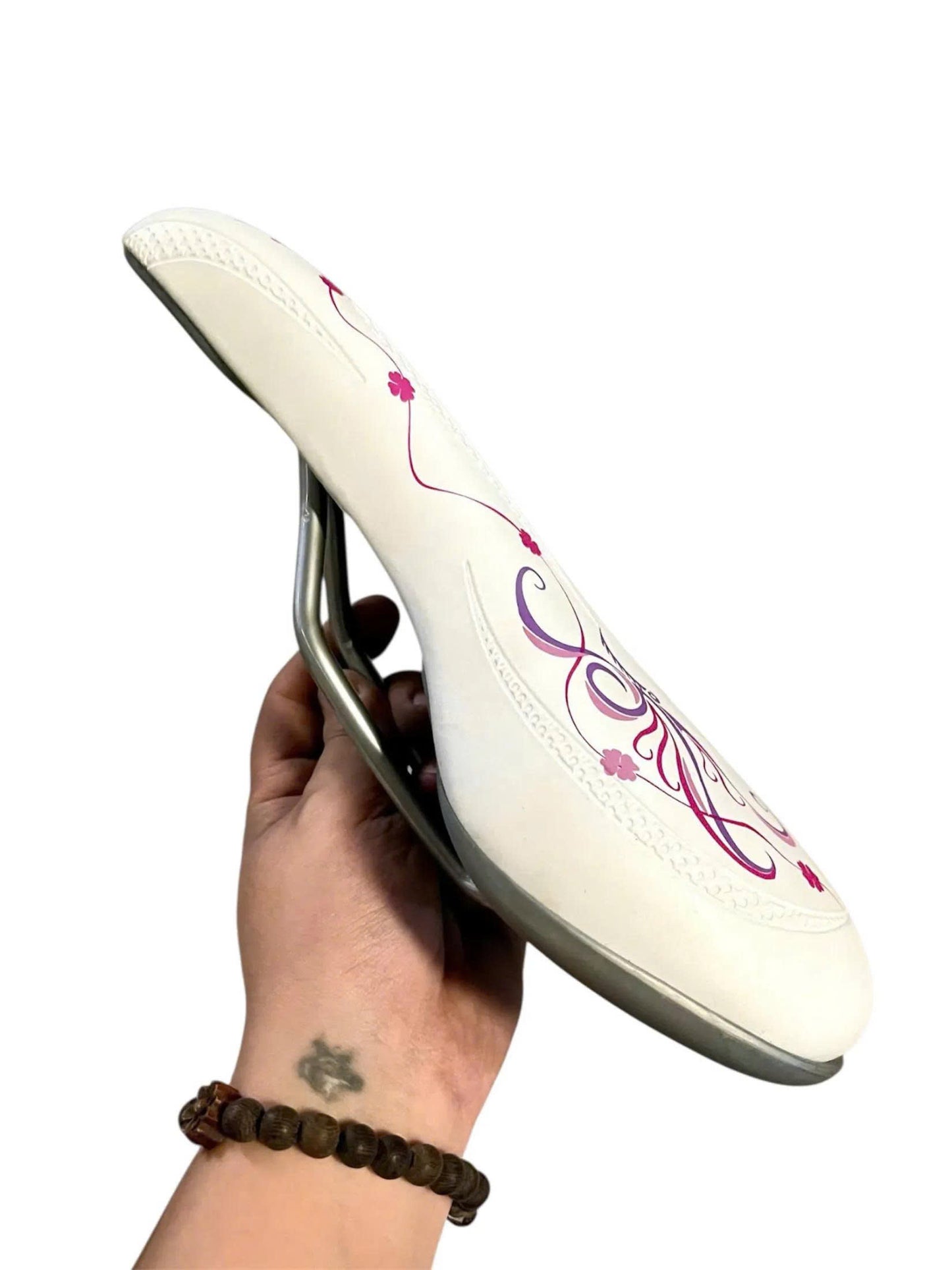 Lutterlly white bicycle saddle with purple trim