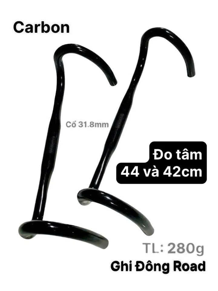 Used full carbon road bike handlebars (take-off). Slight glue residue, easily removable