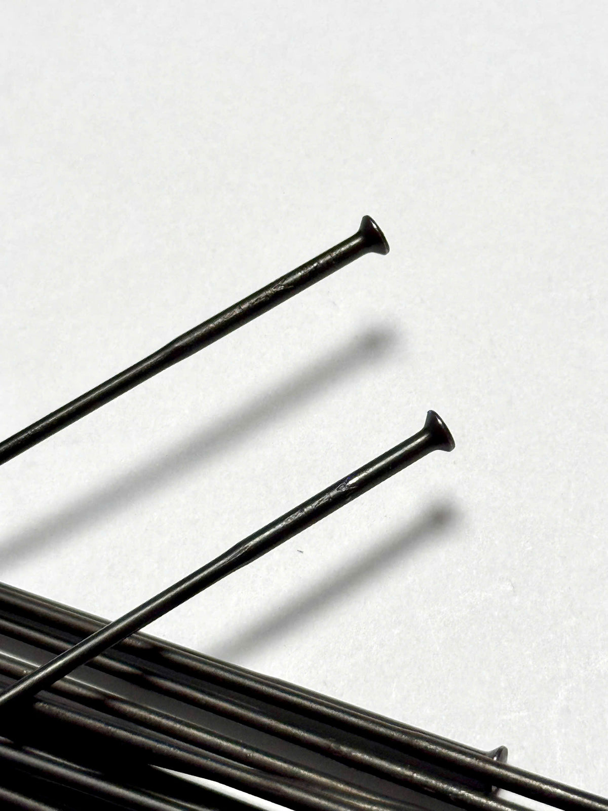 Vittoria straight-pull round double-butted steel bicycle spokes, black, with brass nipples included